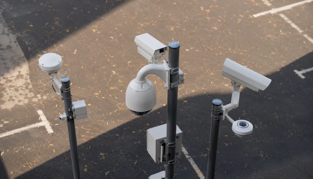 Multiple types of security cameras and sensors in parking lot