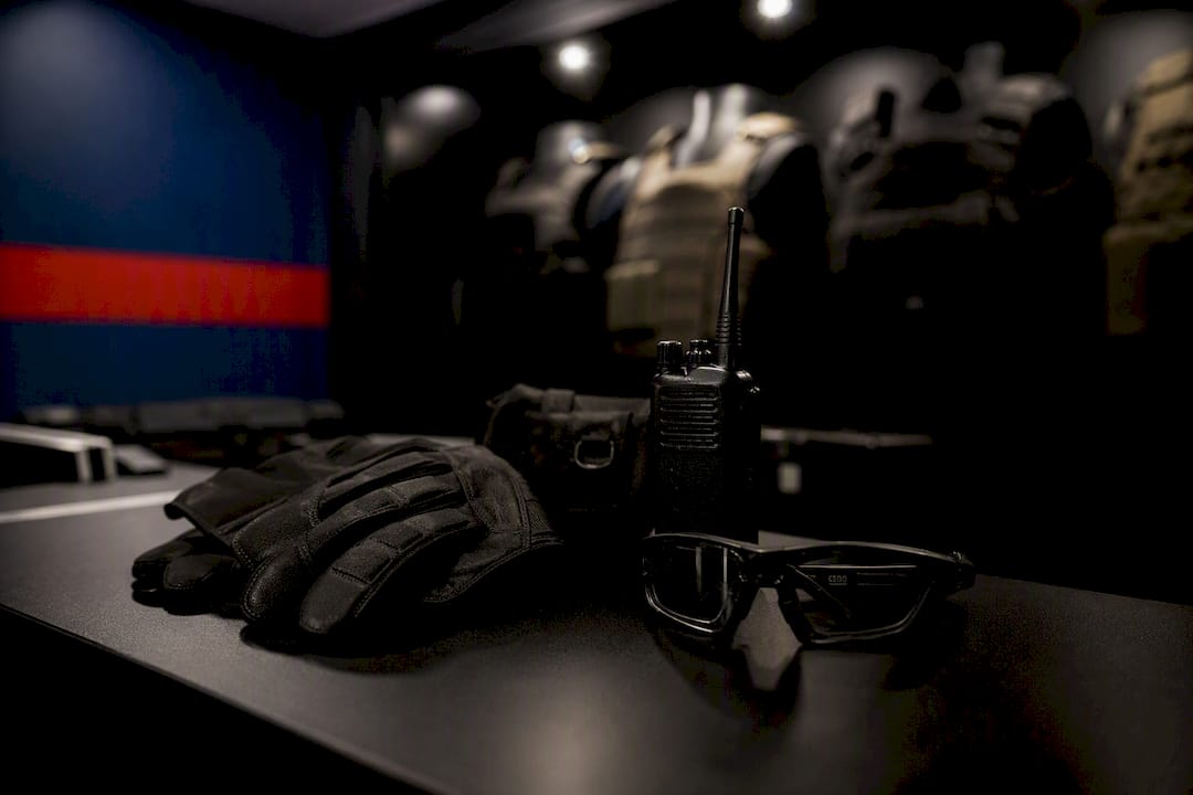 Executive protection tactical gear on table